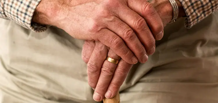 Elderly Man Holding Cane